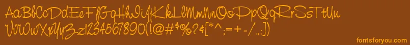 StCursiveHand Font – Orange Fonts on Brown Background
