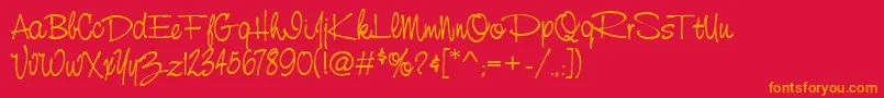 フォントStCursiveHand – 赤い背景にオレンジの文字