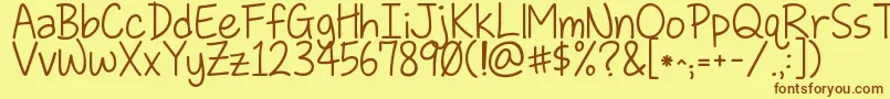 Kglovesomebody Font – Brown Fonts on Yellow Background