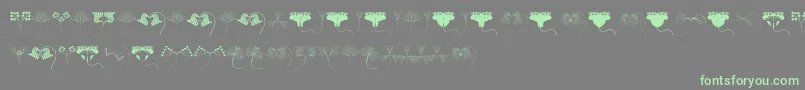 Шрифт JugendstilFlowersFree – зелёные шрифты на сером фоне