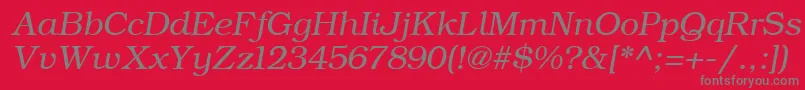 ErBukinistKoi8RItalic-fontti – harmaat kirjasimet punaisella taustalla