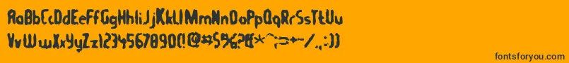 Шрифт Tommygun – чёрные шрифты на оранжевом фоне