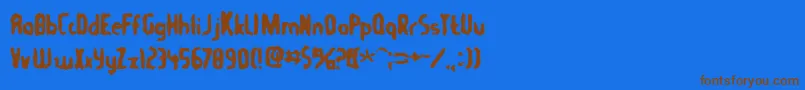 フォントTommygun – 茶色の文字が青い背景にあります。