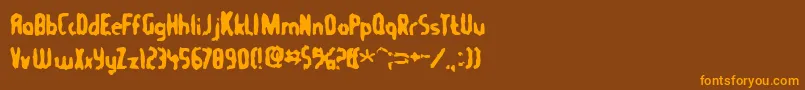 Tommygun Font – Orange Fonts on Brown Background