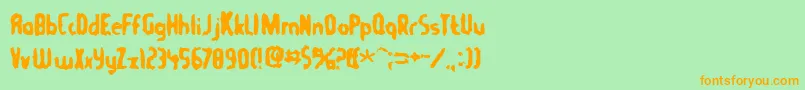 Tommygun Font – Orange Fonts on Green Background