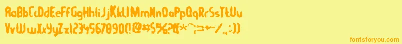 フォントTommygun – オレンジの文字が黄色の背景にあります。