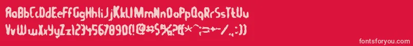 フォントTommygun – 赤い背景にピンクのフォント