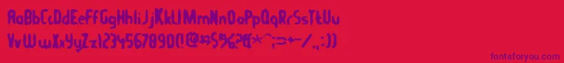 Tommygun Font – Purple Fonts on Red Background