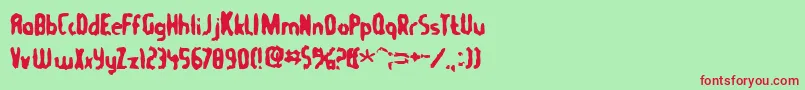 Tommygun-Schriftart – Rote Schriften auf grünem Hintergrund