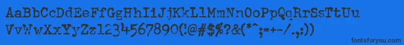 DumboldtypewriterBold-Schriftart – Schwarze Schriften auf blauem Hintergrund