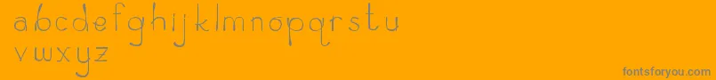 Zeamayseverta-Schriftart – Graue Schriften auf orangefarbenem Hintergrund