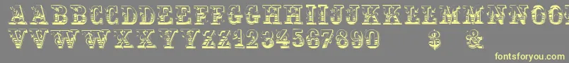 Holtzschue Font – Yellow Fonts on Gray Background