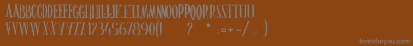 フォントLeGrimoireDuBonheur – 茶色の背景に灰色の文字