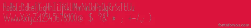 フォントDkPimpernel – 赤い背景に灰色の文字