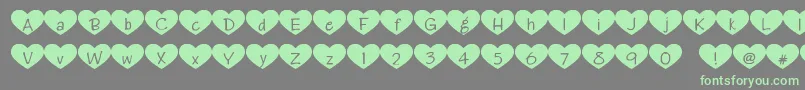 Heartattack Font – Green Fonts on Gray Background