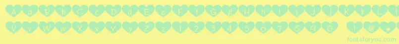 Fonte Heartattack – fontes verdes em um fundo amarelo