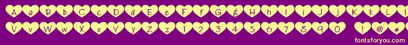 Weitere Informationen zur Heartattack-Schriftart Heartattack-Schriftart – Gelbe Schriften auf violettem Hintergrund