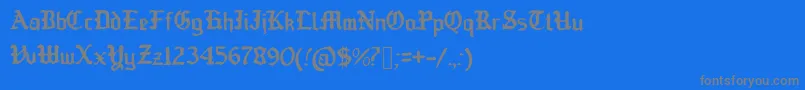 OldEnglishedBoots-Schriftart – Graue Schriften auf blauem Hintergrund
