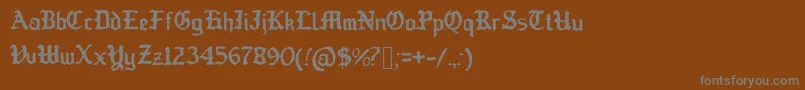 Шрифт OldEnglishedBoots – серые шрифты на коричневом фоне