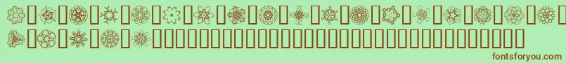 フォントJiKaleidoscopeBats4 – 緑の背景に茶色のフォント