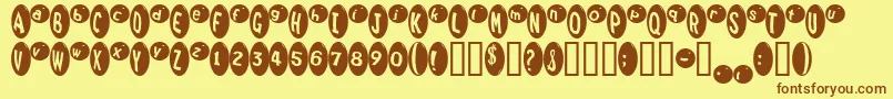MarrididdlesMedium-fontti – ruskeat fontit keltaisella taustalla