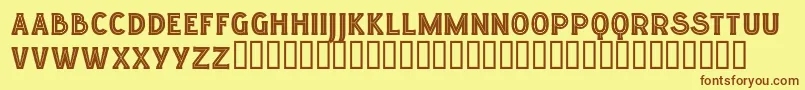 フォントLgfelucidartitularesreg – 茶色の文字が黄色の背景にあります。