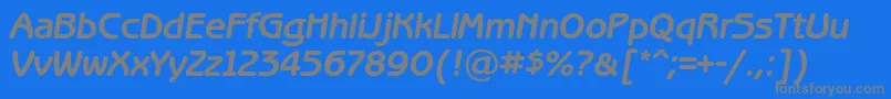 BenguiatgothiccBolditalic-fontti – harmaat kirjasimet sinisellä taustalla