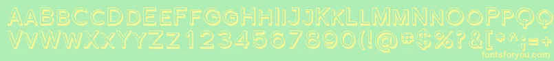 フォントFlorencesansScShaded – 黄色の文字が緑の背景にあります