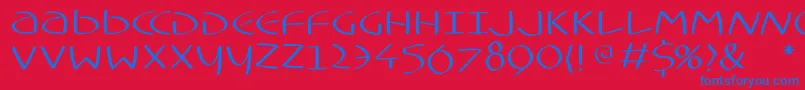 Typoasisuncialfs Font – Blue Fonts on Red Background