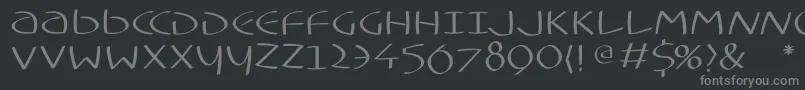 Typoasisuncialfs-fontti – harmaat kirjasimet mustalla taustalla