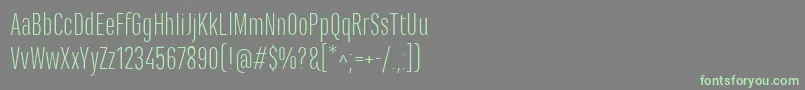 フォントMarianinaCnFyLight – 灰色の背景に緑のフォント