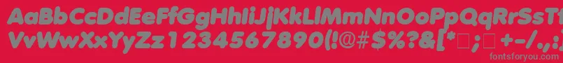 AderaDisplaySsiItalic-Schriftart – Graue Schriften auf rotem Hintergrund