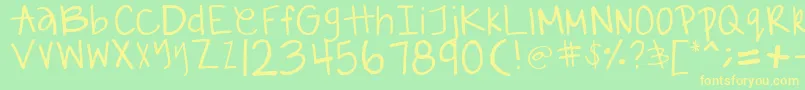 GabiieSHandwritting Font – Yellow Fonts on Green Background