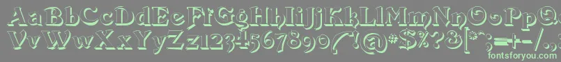 Devinne Swash Shadow Font – Green Fonts on Gray Background