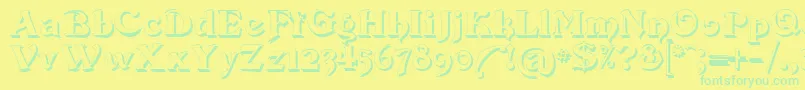 Devinne Swash Shadow Font – Green Fonts on Yellow Background