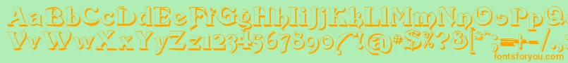 Devinne Swash Shadow Font – Orange Fonts on Green Background