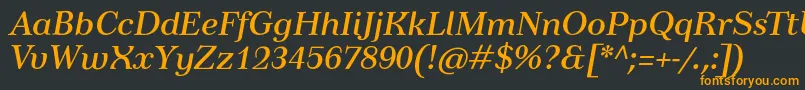 フォントTusardecotextItalic – 黒い背景にオレンジの文字