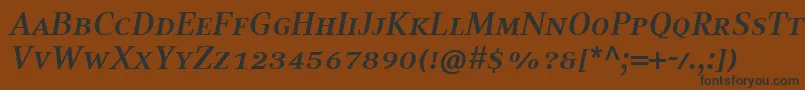フォントCompatilTextLtComBoldItalicSmallCaps – 黒い文字が茶色の背景にあります