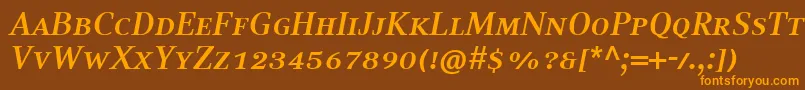 Fonte CompatilTextLtComBoldItalicSmallCaps – fontes laranjas em um fundo marrom