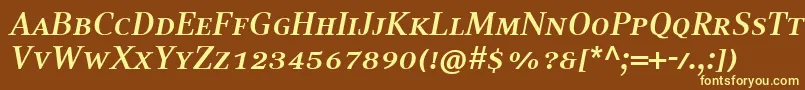 CompatilTextLtComBoldItalicSmallCaps-fontti – keltaiset fontit ruskealla taustalla