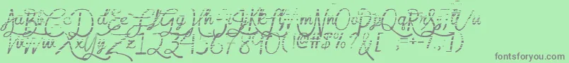 フォントMfGradientGoddess – 緑の背景に灰色の文字