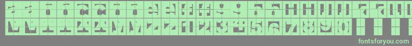 Fonte FragmentcapsCross – fontes verdes em um fundo cinza