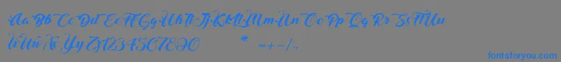 ChristmasInFinland-Schriftart – Blaue Schriften auf grauem Hintergrund