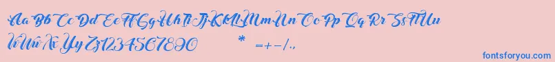 フォントChristmasInFinland – ピンクの背景に青い文字