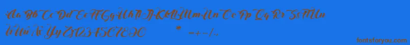 フォントChristmasInFinland – 茶色の文字が青い背景にあります。