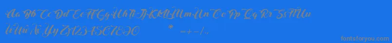 フォントChristmasInFinland – 青い背景に灰色の文字