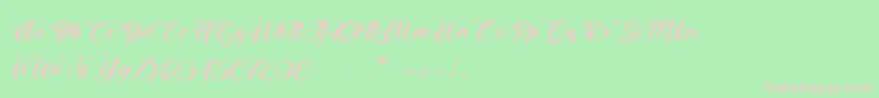 フォントChristmasInFinland – 緑の背景にピンクのフォント
