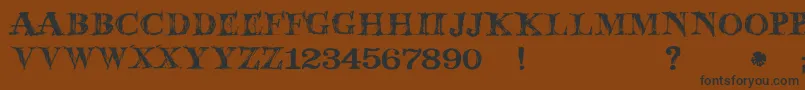 JmhWolfa Font – Black Fonts on Brown Background