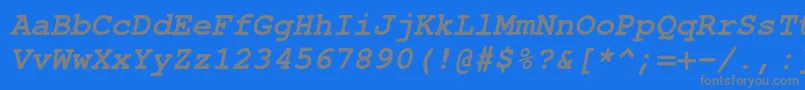 TexgyrecursorBolditalic-fontti – harmaat kirjasimet sinisellä taustalla