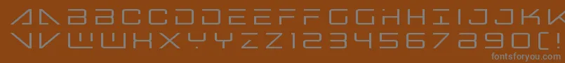 Bansheepilottitle-fontti – harmaat kirjasimet ruskealla taustalla